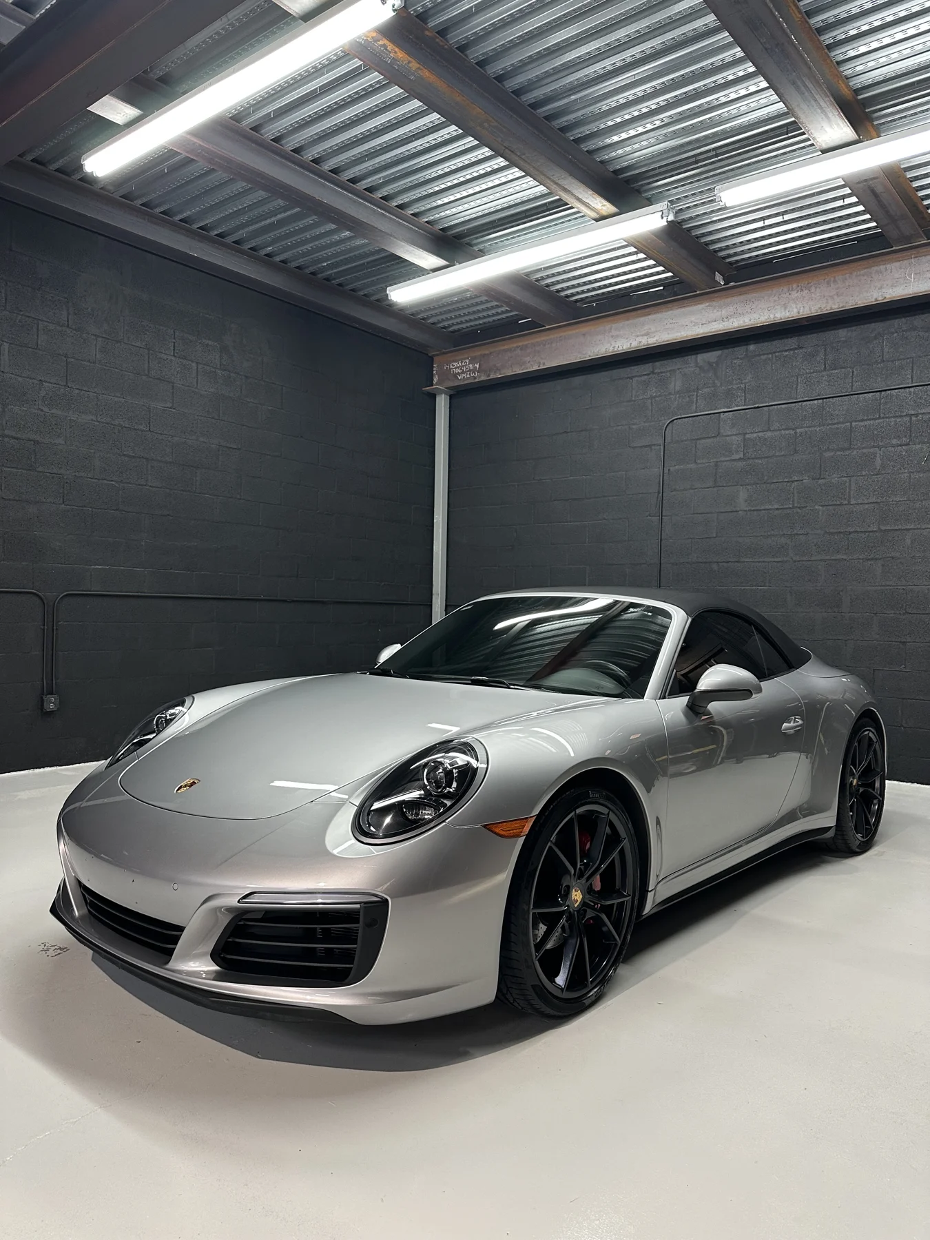 Silver Porsche at the Dillux Auto Spa studio