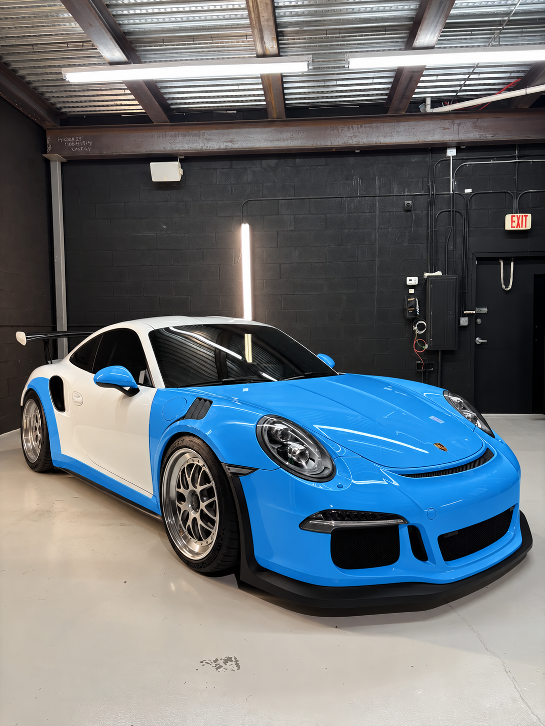 Porsche with race track PPF coverage highlighted in blue